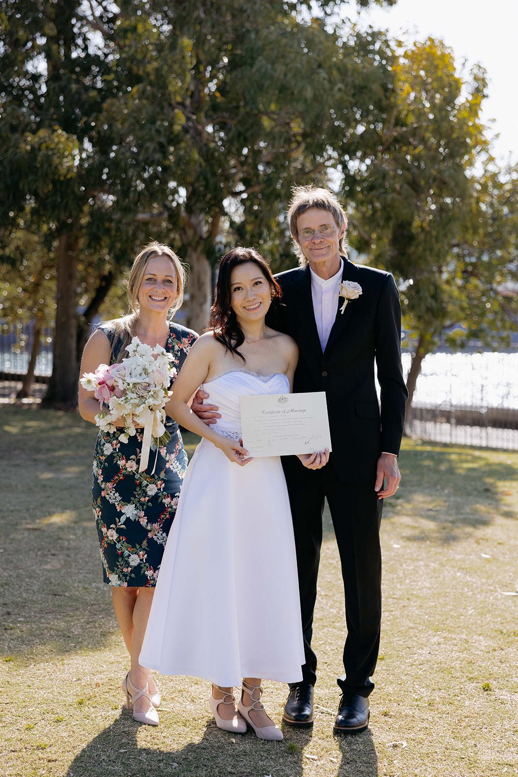 A small Sydney Harbour ceremony, two witnesses with the couple.